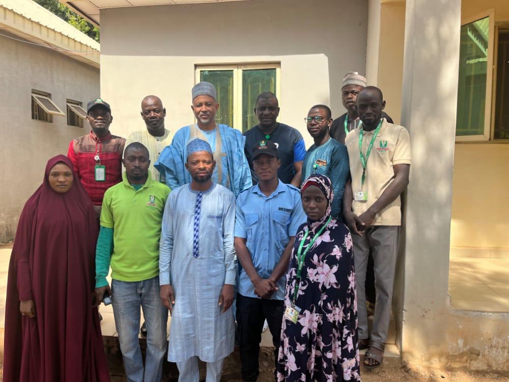 Dean FHS with staff of Danbatta community centre