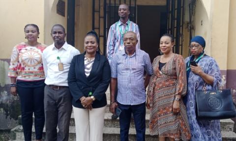 Dr.Okpala (3rd from left) in a group photograph with staff of Special Study Centre for the Nigerian Immigration Services, Gwagwalada