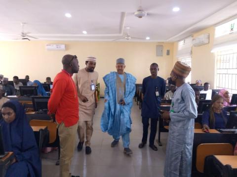 Dean Faculty of Health science(Middle) monitoring the ongoing e-exam at Fagge Centre