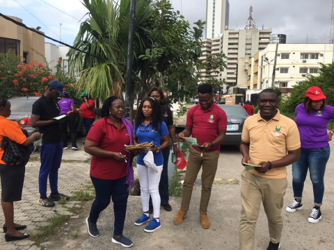 The advocacy team giving out leaflets to residents